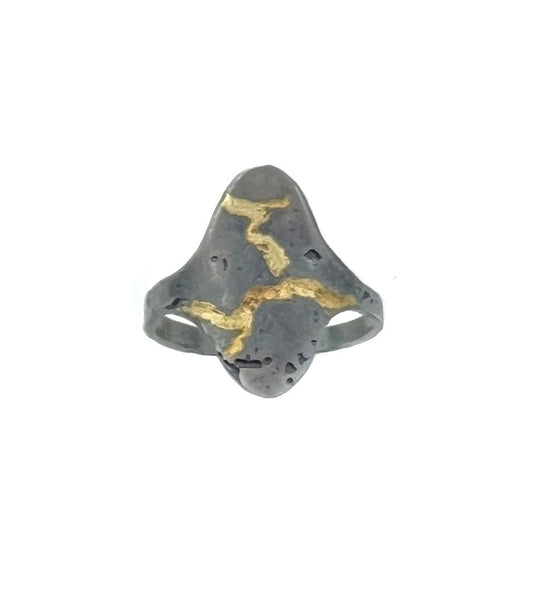 Handmade silver ring, with gold accents in a cracked earth pattern, handmade by artist Laura Lau Klein